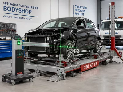 Vehicle accident repair and structural restoration in progress